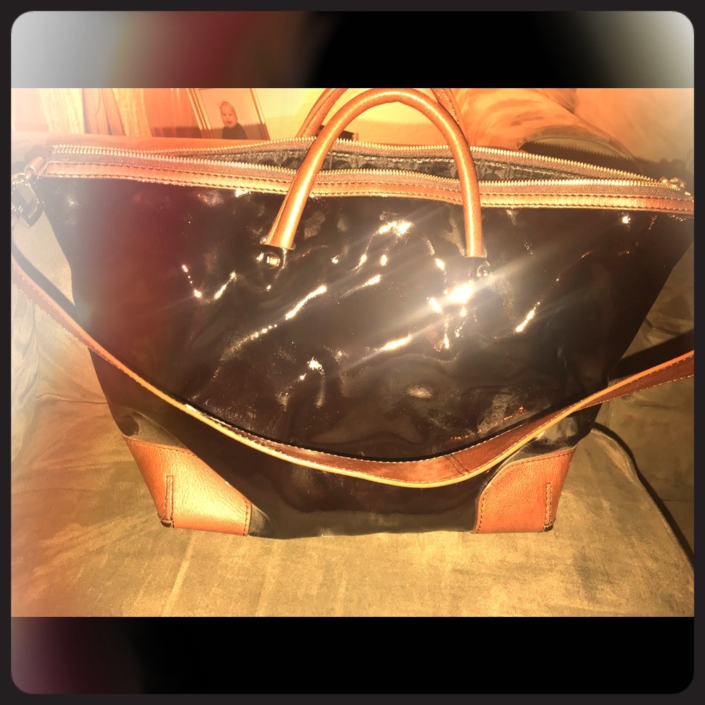 The brand Kate spade black patent leather purse